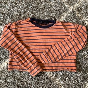 orange and blue striped long sleeve crop top